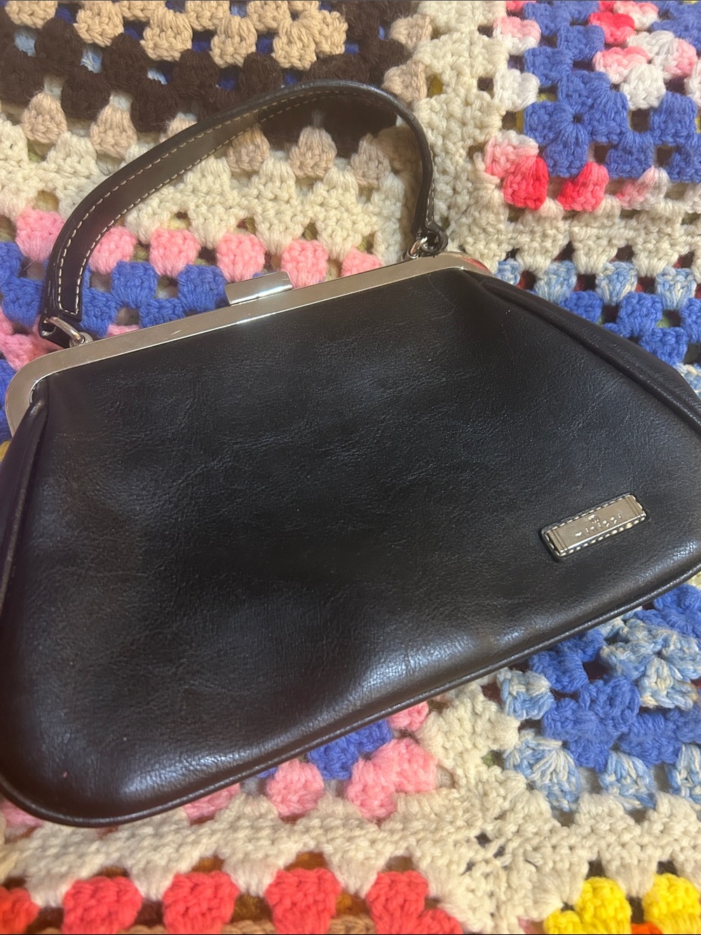 Kisslock handbag.